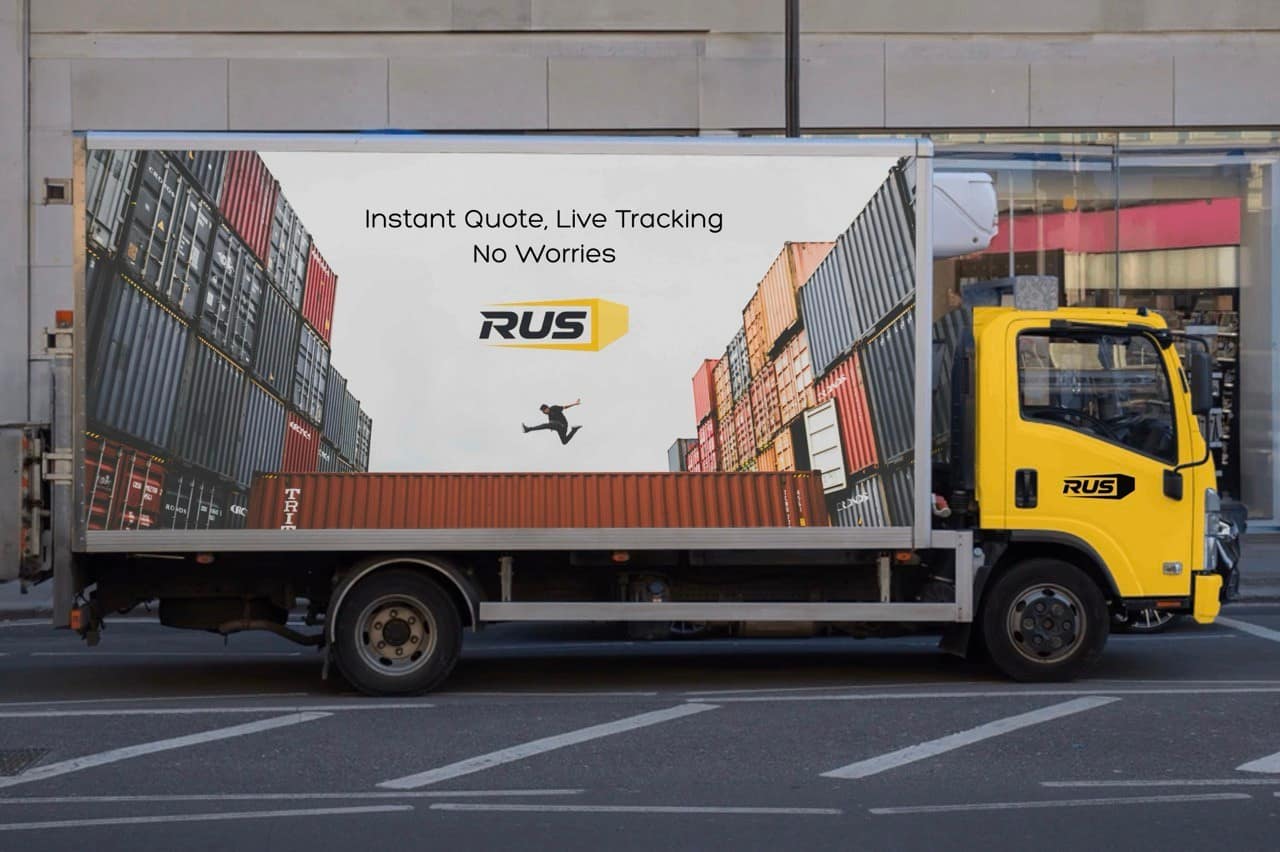 Gulf Ocean Shipping truck artwork with container branding in an urban street